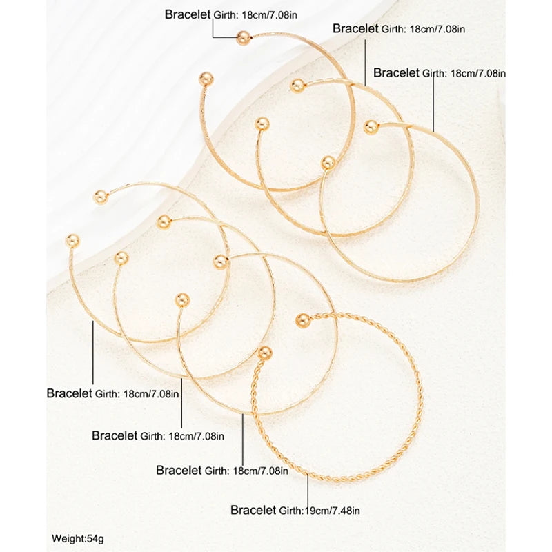 Golden Glow Luxe Bangle Set – 7 Delige Goudkleurige Armbandenset